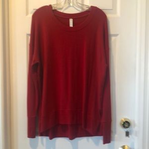 Athleta-Beautiful red top, Size Large with two thumb openings..